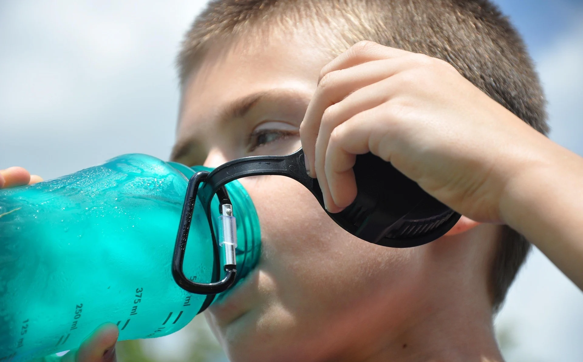 Child drinking water to stay hydrated during Hot Lowveld Summers in Mbombela