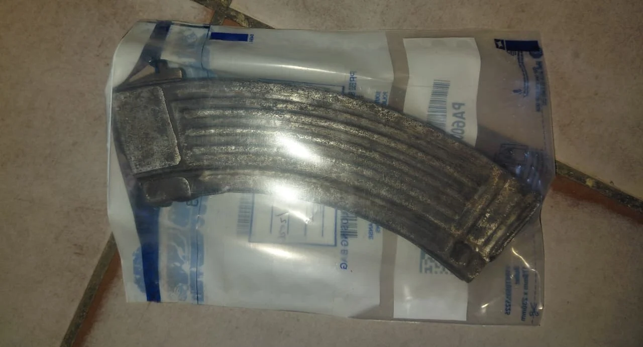 Rifle magazine seized in SAPS evidence bag during Operation Shanela II in Mpumalanga